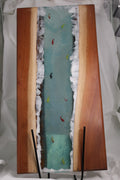 Handcrafted river resin serving board with blue resin and fish inlay
